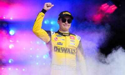 Christopher Bell gestures prior to a NASCAR Cup Series auto race at Charlotte Motor Speedway, S ...