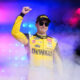 Christopher Bell gestures prior to a NASCAR Cup Series auto race at Charlotte Motor Speedway, S ...