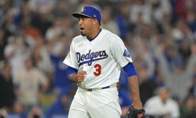 Diaz thrills Dodger Stadium with trumpet entrance, first save
