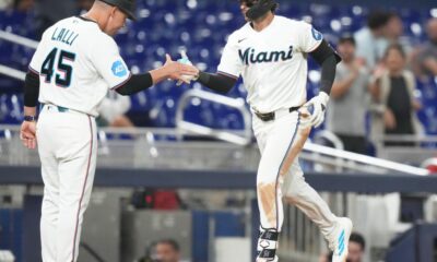 Miami Marlins end Cincinnati Reds' 5-game winning streak, beating them 7-4