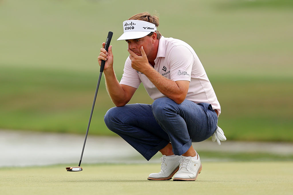 HOUSTON, TEXAS - MARCH 28: Keith Mitchell of the United States lines up a putt on the 16th green during the third round of the Texas Children's Houston Open 2026 at Memorial Park Golf Course on March 28, 2026 in Houston, Texas.