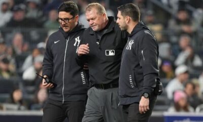 Umpire Ron Kulpa out with concussion after hit to mask