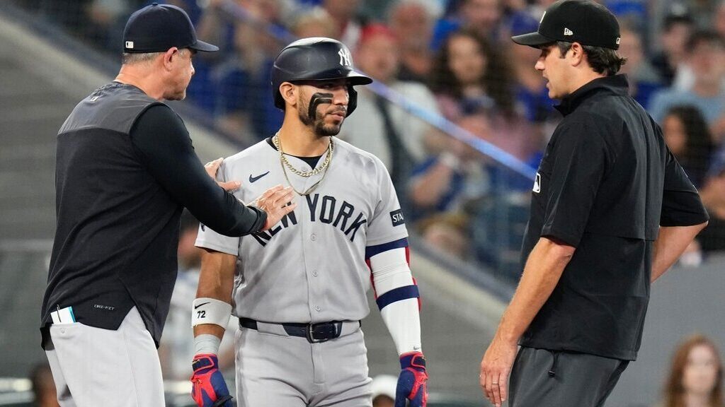 Aaron Boone discusses Jose Caballero's delay-of-game with MLB