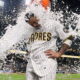 Machado hits a 10th-inning RBI single, lifting Padres past Braves 7-6