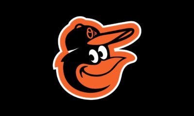 Orioles trade cash to Reds for hard throwing reliever