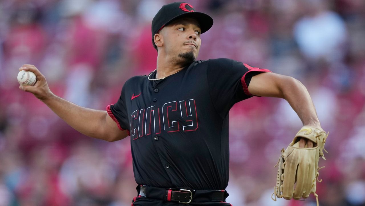 Cincinnati Reds pitcher Chase Burns throws during the first inning of a baseball game against the Colorado Rockies in Cincinnati, Friday, July 11, 2025. (AP Photo/Carolyn Kaster)