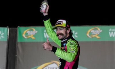 Ryan Blaney celebrates after winning a NASCAR Cup Series auto race, Sunday, July 12, 2026, in Hampton, Ga. (AP Photo/Mike Stewart)