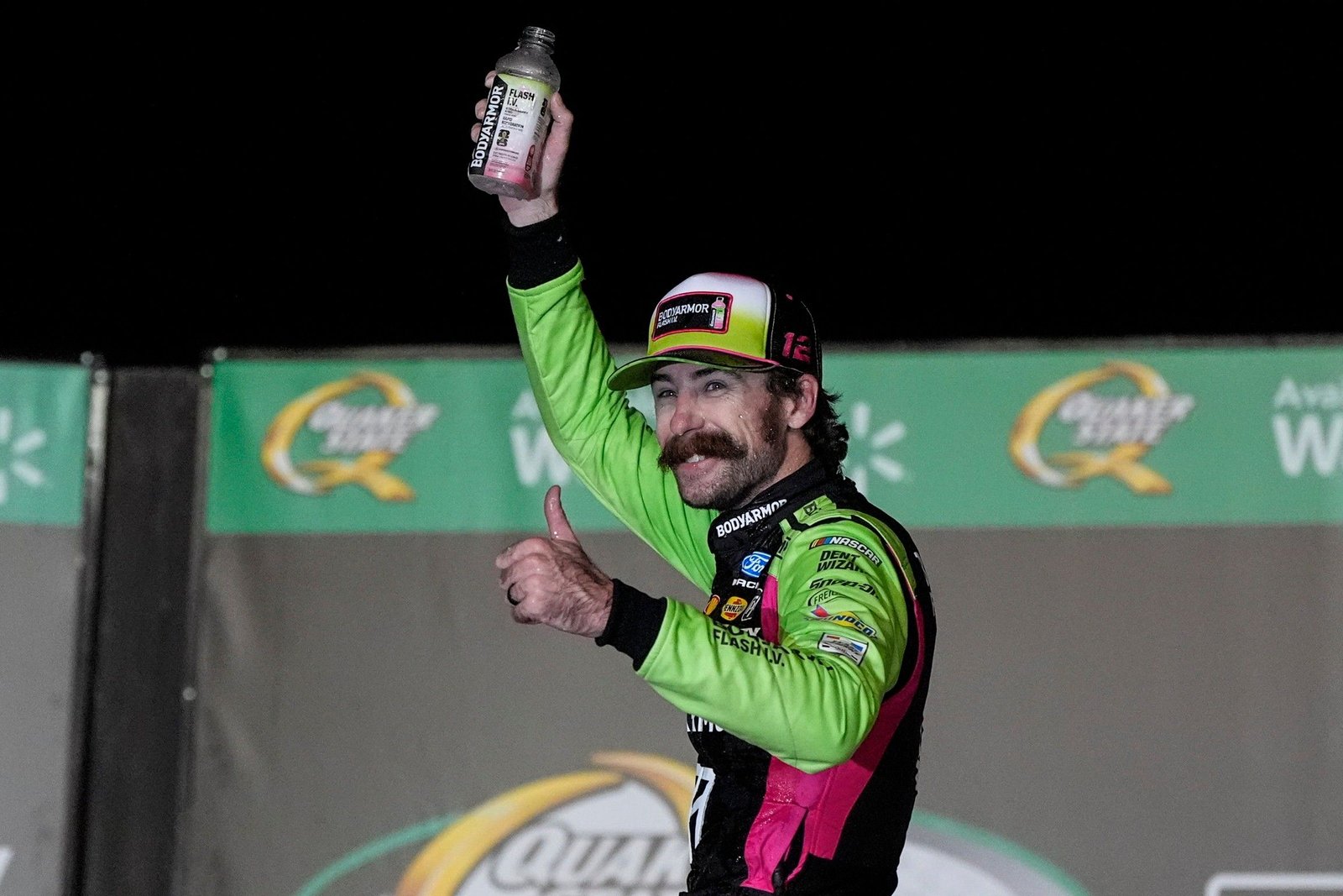 Ryan Blaney celebrates after winning a NASCAR Cup Series auto race, Sunday, July 12, 2026, in Hampton, Ga. (AP Photo/Mike Stewart)